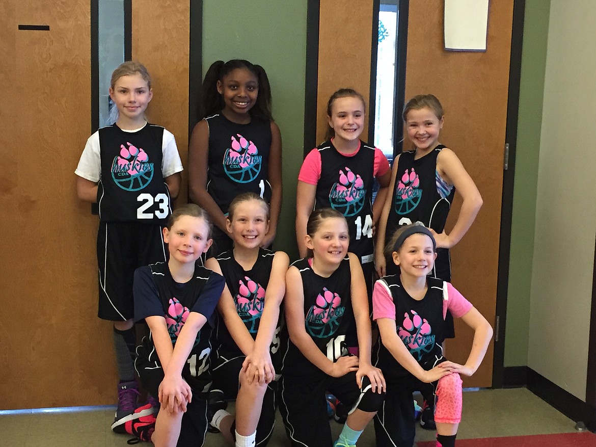 Courtesy photo
The Coeur d&#146;Alene Huskies third-grade girls team finished second place in the fourth-grade girls division of the Post Falls competitive basketball league. In the front row from left are Kate Moglia, Addie Hildreth, Presley Fagan and Mia Shull; and back row from left, Sophie Schreiber, Anaya Watson, Kyndal Bridge and Courtney Johnson.