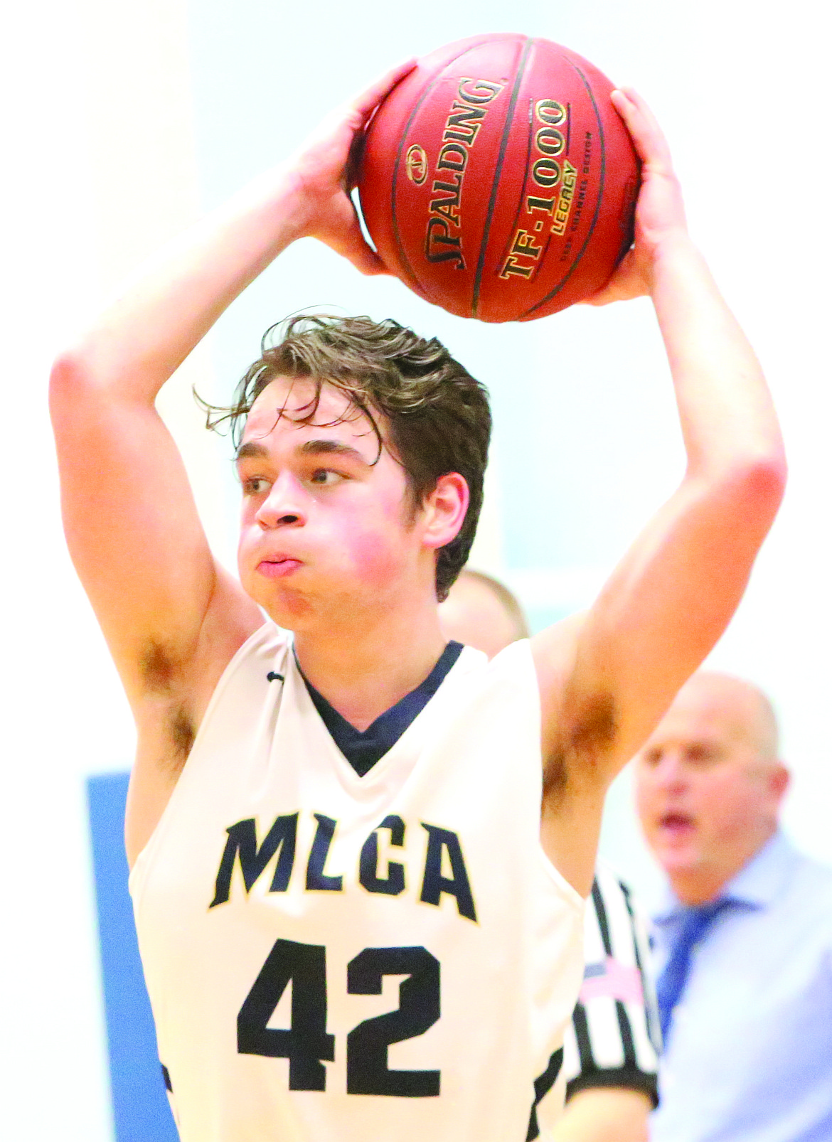 Connor Vanderweyst/Columbia Basin Herald
Moses Lake Christian senior Caedmon Waldrop looks to make a pass against Easton.