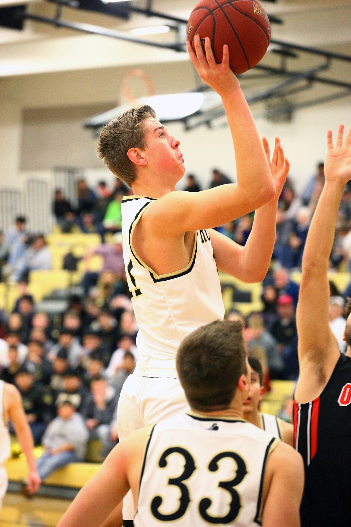 Rodney Harwood/Columbia Basin HeraldRoyal junior Sawyer Jenks (11) puts up a runner through the lane during the second quarter of Tuesday's non-league game against Othello.