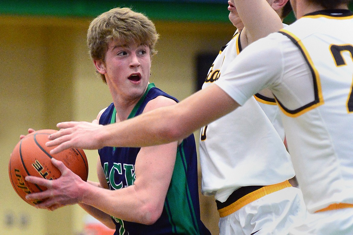 Glacier&#146;s Caden Harkins looks to pass during a 44-38 win over Helena Capital at Glacier High School on Saturday. (Casey Kreider/Daily Inter Lake)