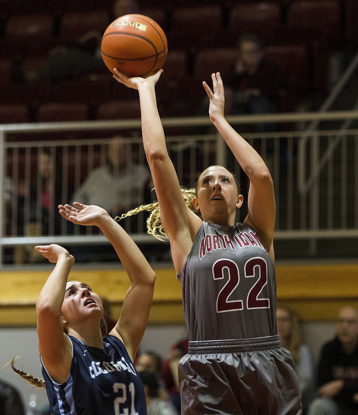 North Idaho College guard Shelby Jordan shoots a two-pointer over Columbia Basin&#146;s Aspen Fiander during Wednesday game at NIC. 
LOREN  BENOIT/Press