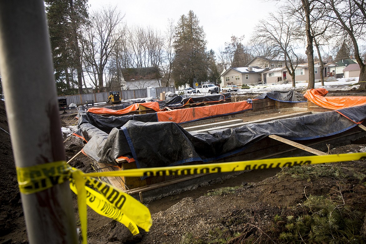 A development group plans to construct five townhomes on the Sherman side of the parcel and three single-family homes on the Lakeside side.