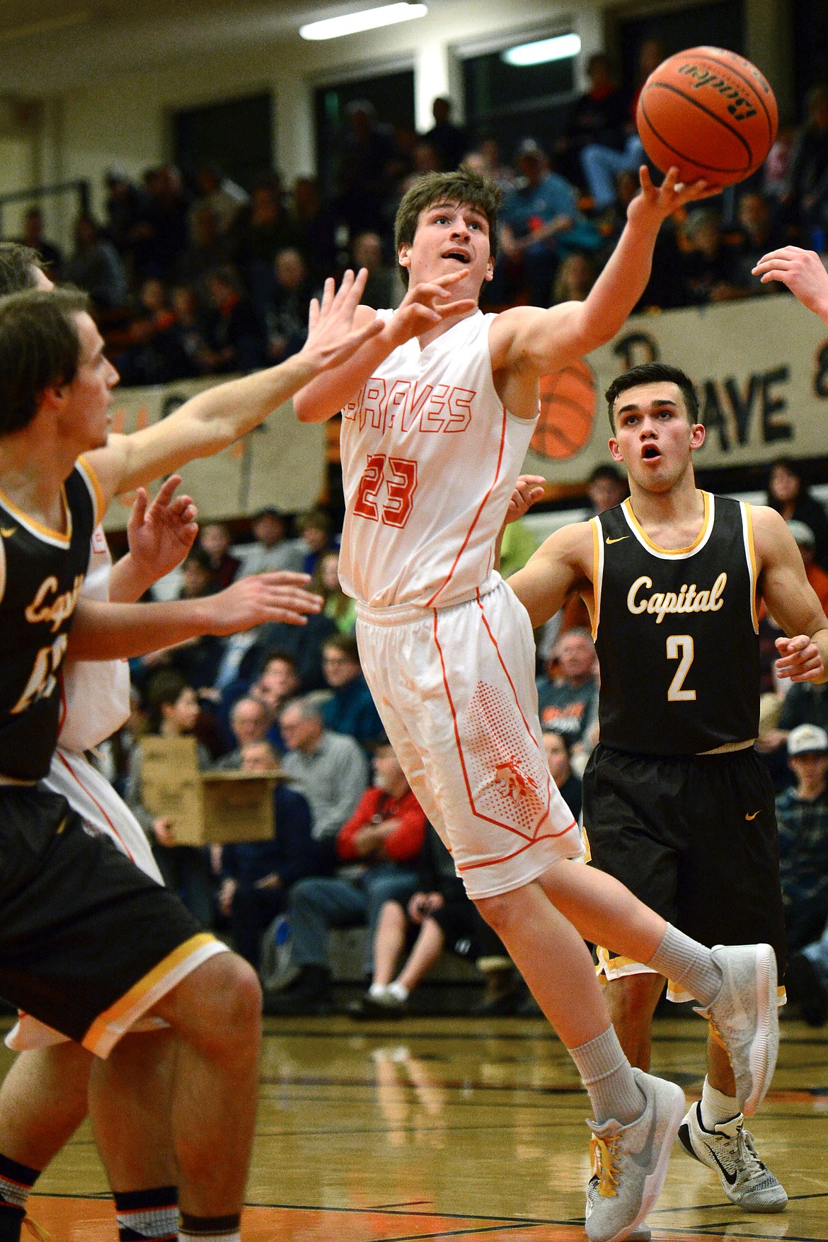 Flathead's Eric Seaman goes to the hoop in the fourth quarter against Helena Capital on Friday. (Casey Kreider/Daily Inter Lake)