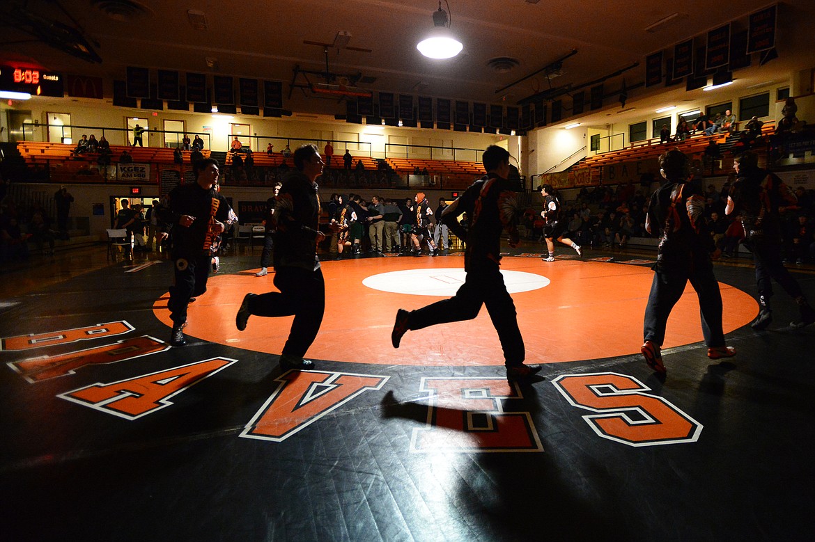 Flathead wrestlers warm up before a dual with Glacier at Flathead High School on Thursday, Jan. 11. (Casey Kreider/Daily Inter Lake)