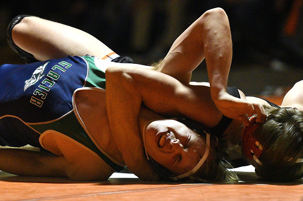 Flathead's Tanner Russell, right, works toward a pin of Glacier's Colton Todd at 145 pounds on Thursday at Flathead High School. (Casey Kreider/Daily Inter Lake)