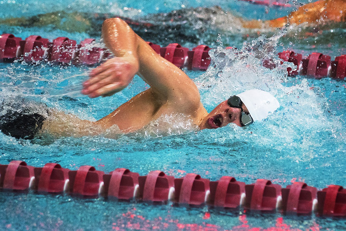 Payton Malmberg swims his leg of the 200-yard freestyle relay Saturday. Columbia Falls finished third in the event. (Jeremy Weber photo)