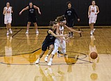 Trojans get out and run, roll T-Wolves