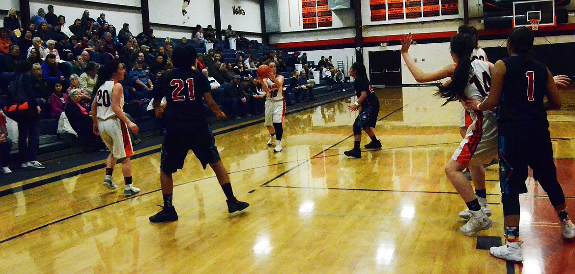 Trotter offense in action against the Lady Eagles. (Erin Jusseaume/ Clark Fork Valley Press)