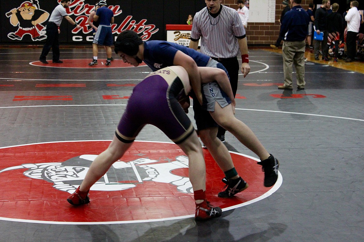 Photo by Chanse Watson/
Wallace wrestler Trevor Harshman controls his opponent&#146;s legs.