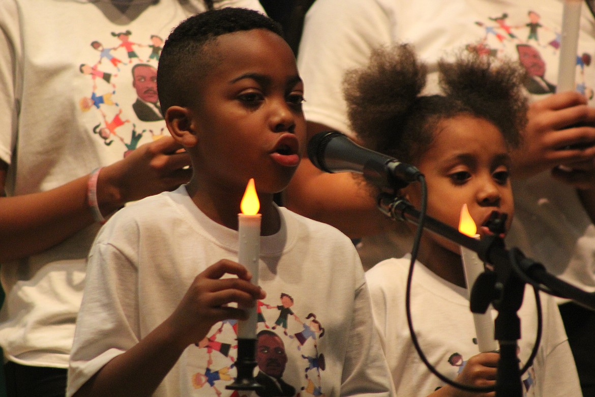 Richard Byrd/Columbia Basin Herald - Dreamers in Action choir members sing during Monday night's Martin Luther King Jr. celebration in Moses Lake.