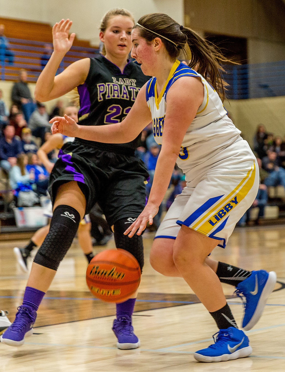 Libby&#146;s Sammee Bradeen dribbles past Polson&#146;s Quinn Motichka Saturday.