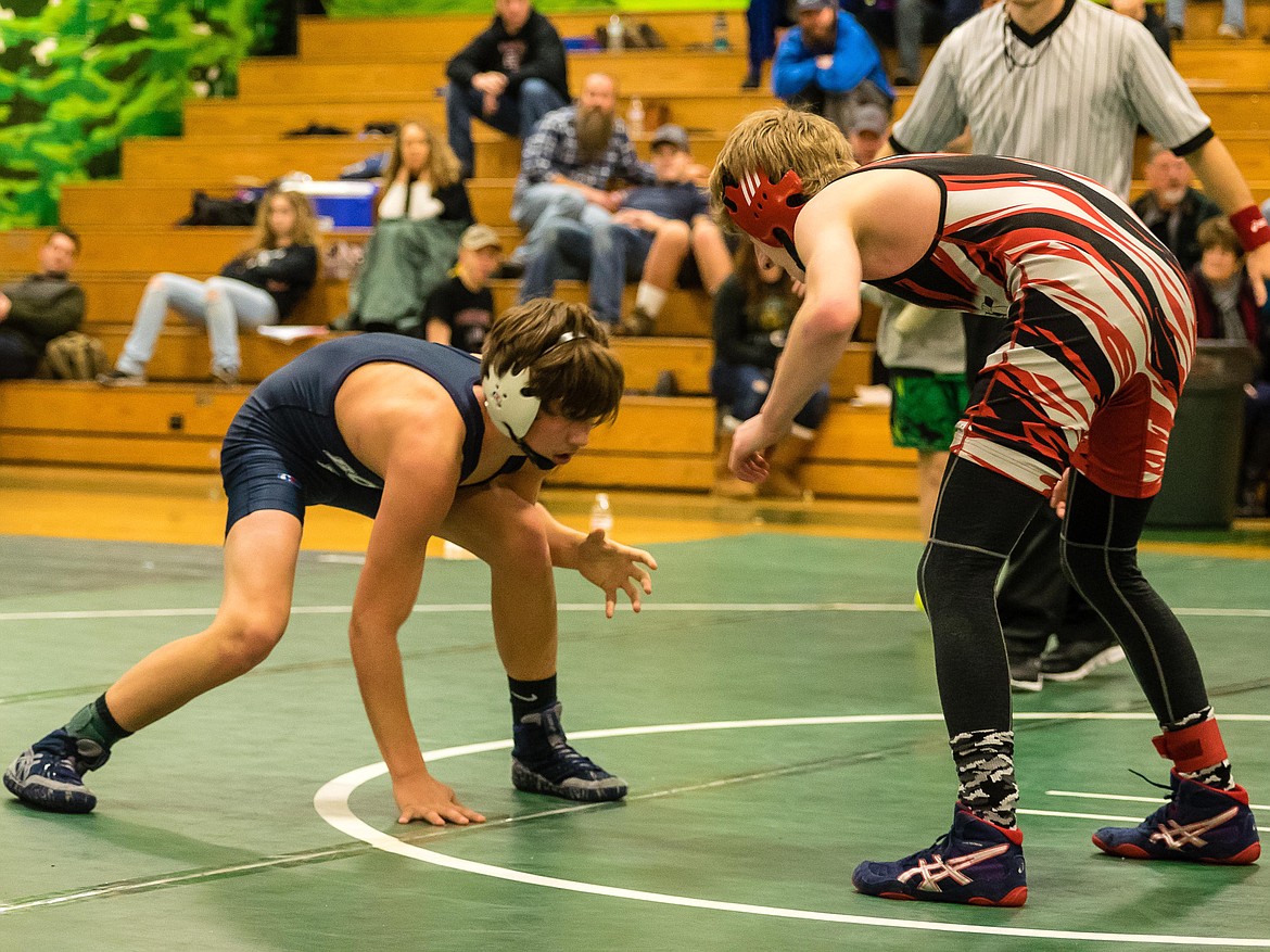 Photos by Doug Beazer
Evan Barajas (top photo) and Tyler Beazer (left photo) both won their weight class at the Jan. 6 Chad E. Ross Memorial Tournament in St. Maries. Also taking first in their weight classes for BFHS were Austin Madden and Gabe See.