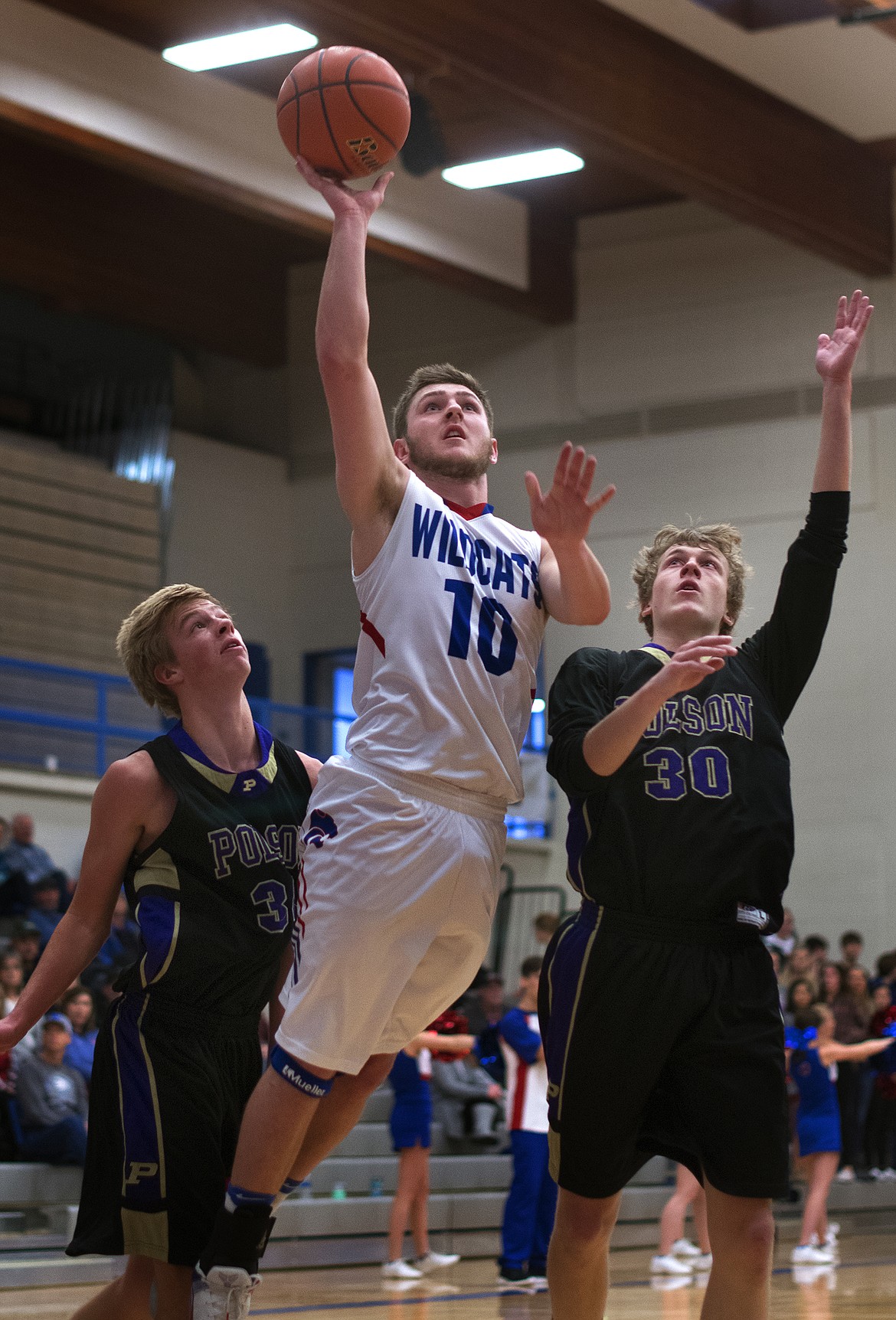 Austin Green goes up for a running jumper against the Pirates Saturday. (Jeremy Weber photo)