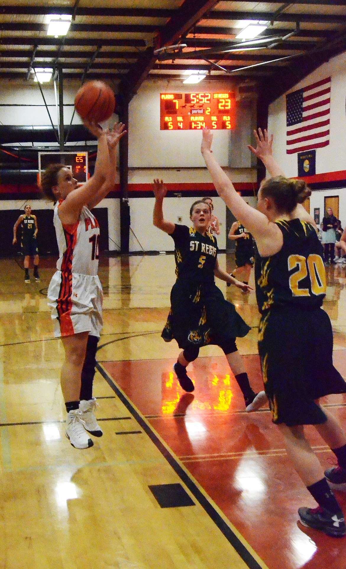 Kassidy Kinzie (10) goes for a quick shot during the second period to strength the Trotters lead over the Lady Tigers (Erin Jusseaume/ Clark Fork Valley Press)