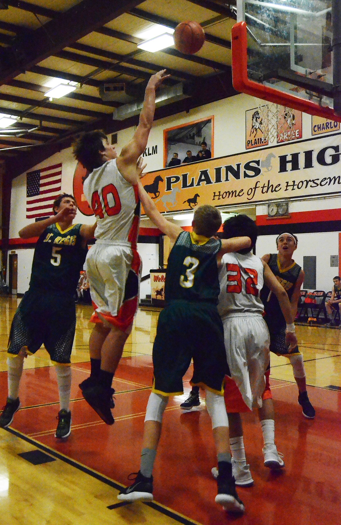 Jay Vonheeder (40) uses precision to sink another basket for the Horsemen (Erin Jusseaume/ Clark Fork Valley Press)