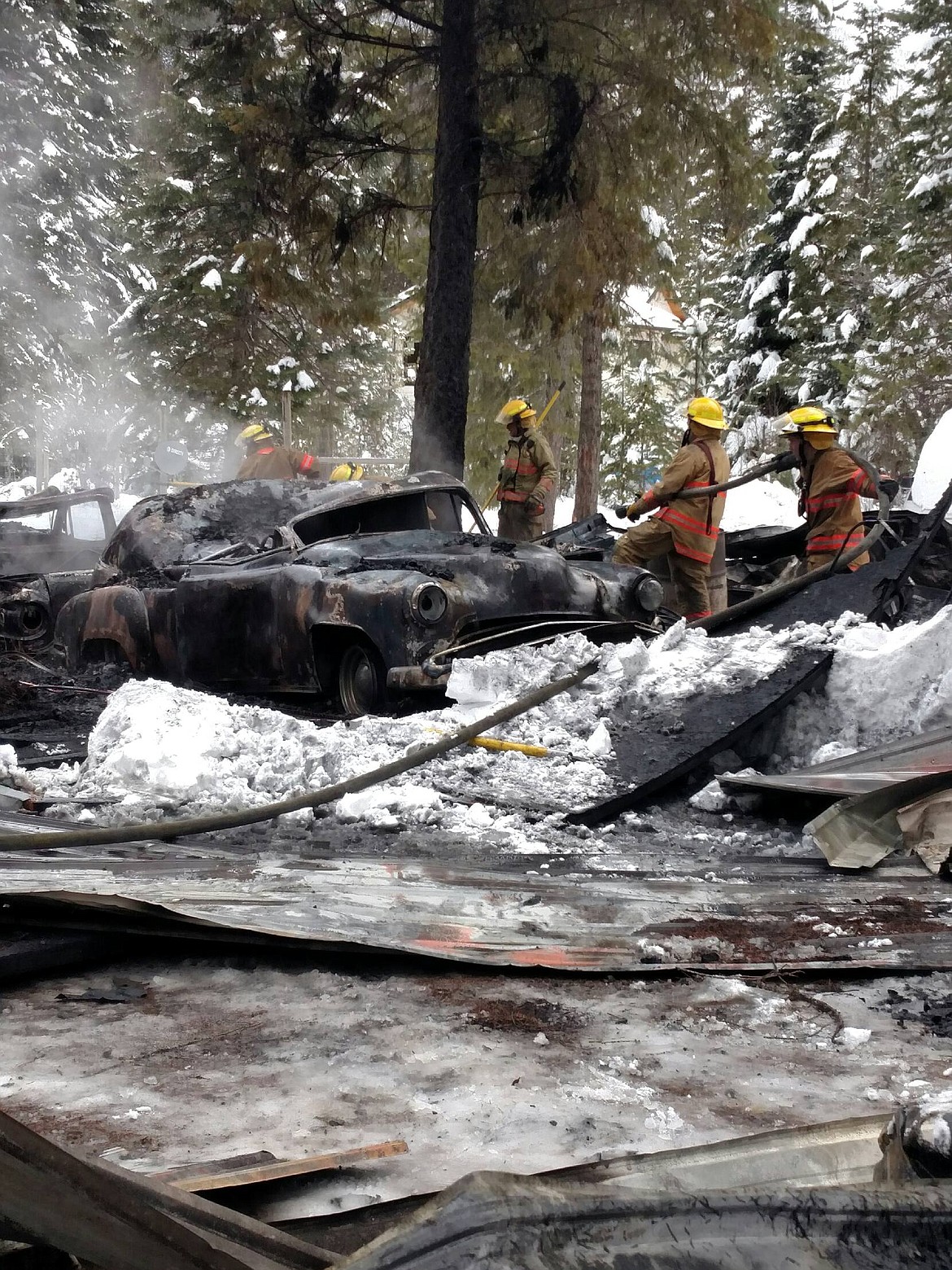 Courtesy photo
These classic cars were lost in a Jan. 5 structure fire on Moyie River Road.