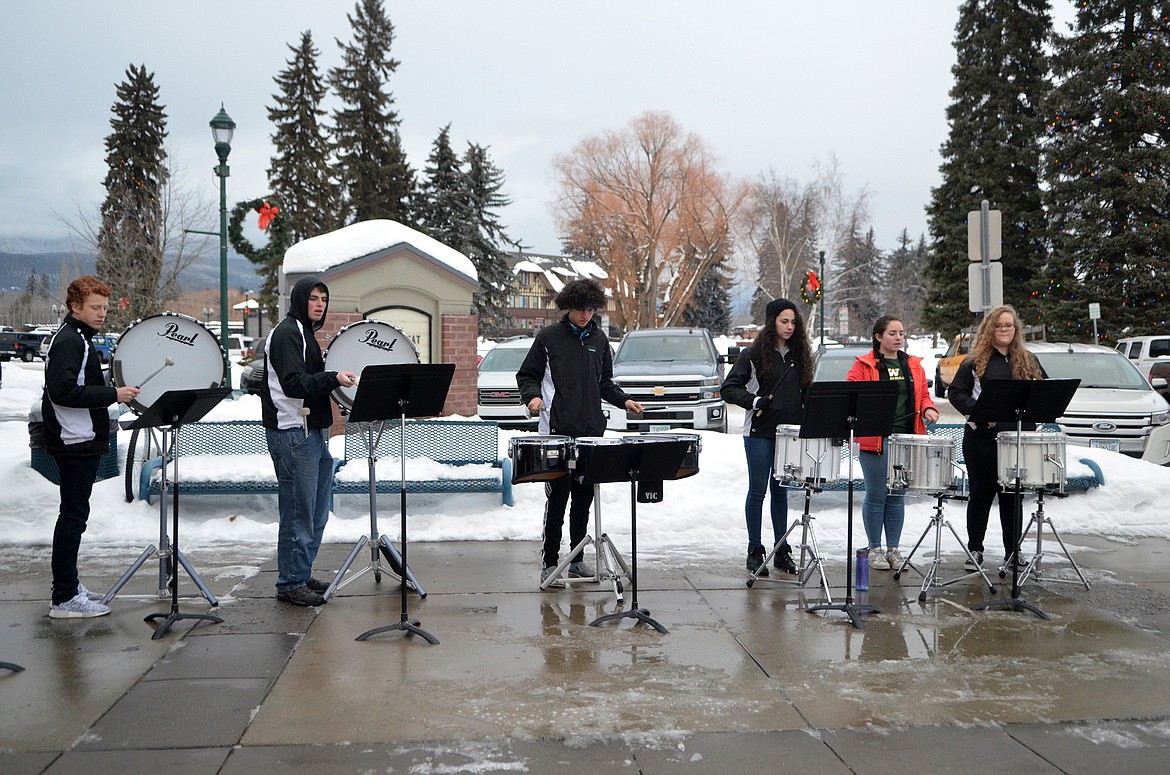 The Whitefish High School Drumline plays Saturday outside the O&#146;Shaugnessy Center before the coronation ceremony for the Whitefish Winter Carnival king and queen. (Heidi Desch/Whitefish Pilot)