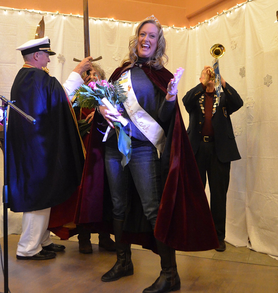 Duchess of Lark Stephanie Skinner celebrates Saturday evening after being knighted at the O&#146;Shaughnessy Center following the coronation of the Whitefish Winter Carnival king and queen. (Heidi Desch/Whitefish Pilot)