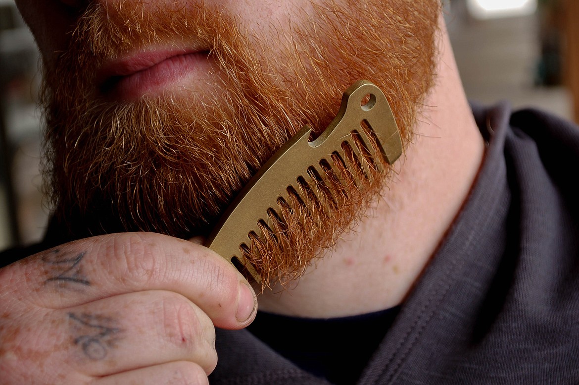 Solid brass pocket beard comb by Folkland.