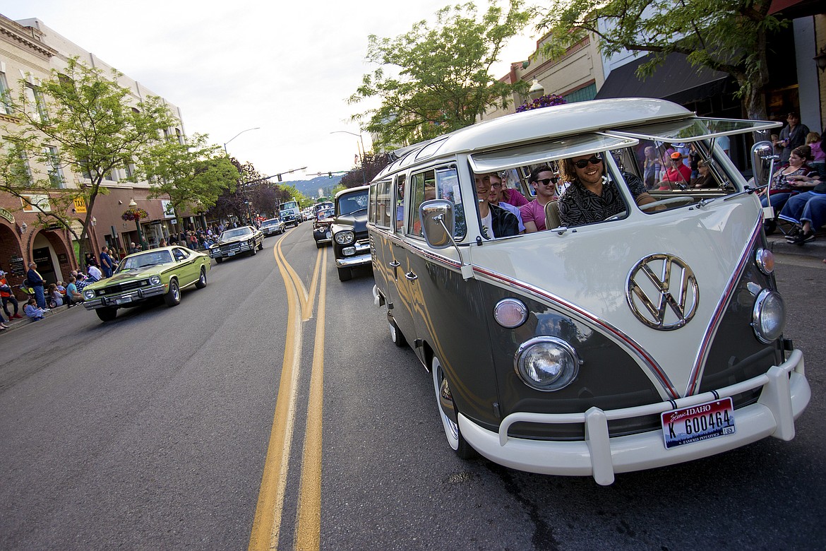 Tanner Horton drives his friends down Sherman Avenue in his restored 1964 Volkswagon Bus during Car d'Lane 2016. (JAKE PARRISH/Press File)