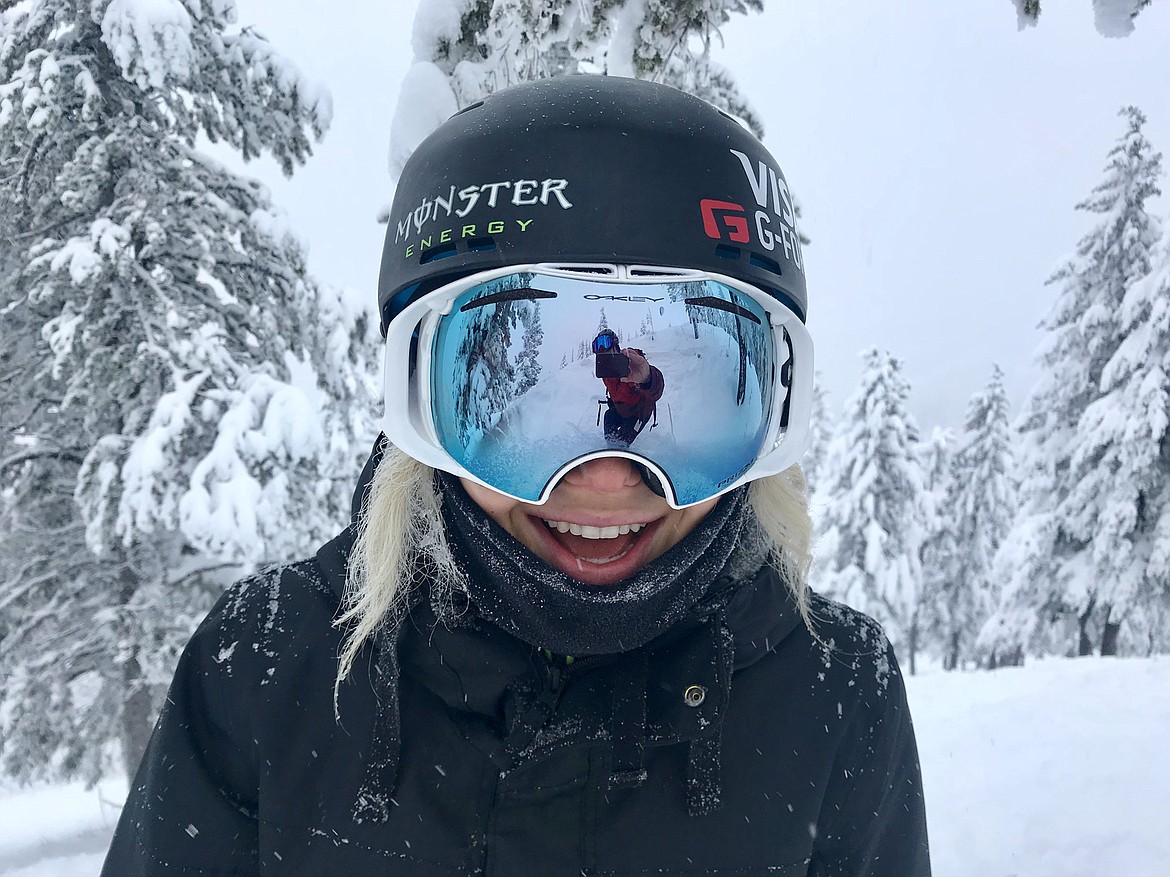 Maggie Voisin was all smiles Thursday as she skied powder with friends and family in the morning and then greeted the public for the annual ski with Maggie day in the afternoon. (c) Brian Schott