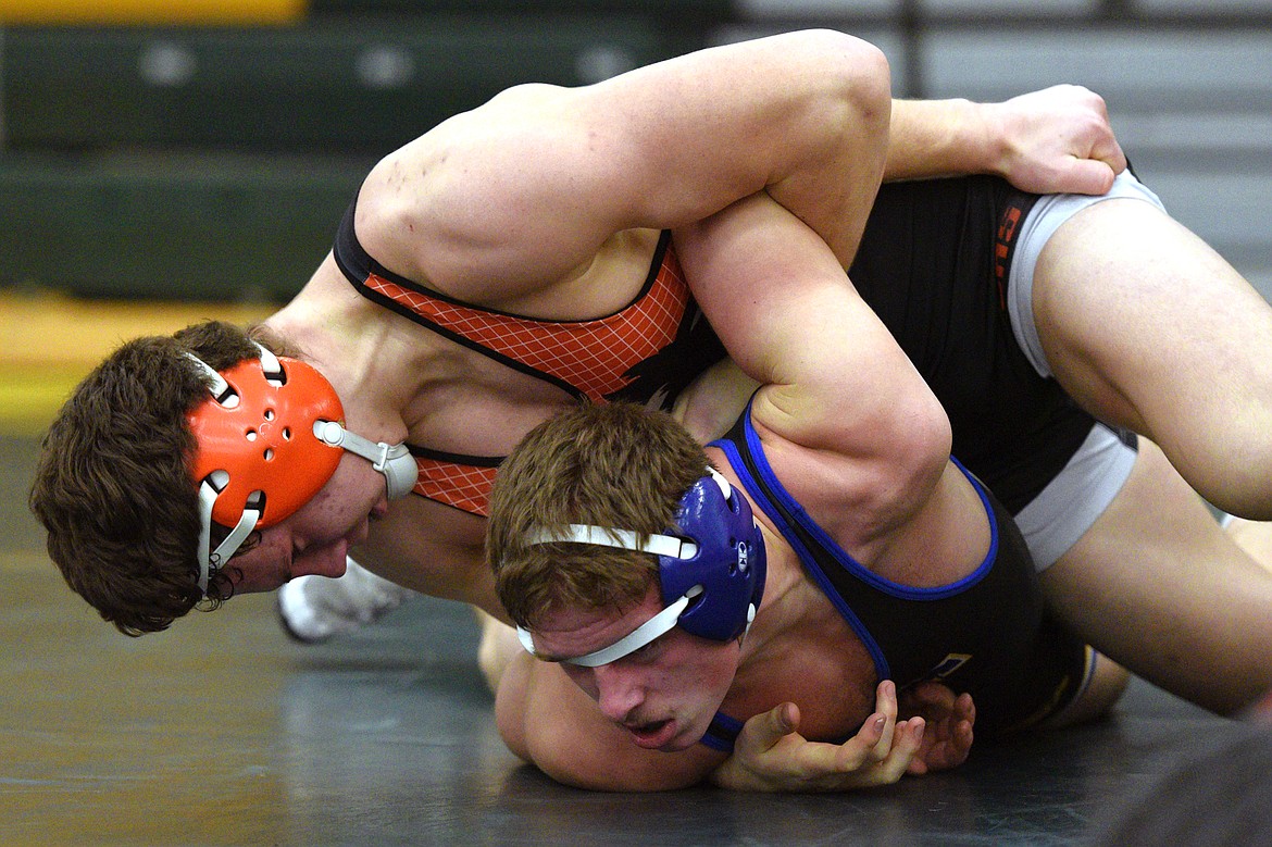 Eureka&#146;s Garrett Graves wrestles Thompson Falls&#146; Jase Sorenson at 182 pounds at the Whitefish Duals at Whitefish High School on Friday. Graves won by decision. (Casey Kreider/Daily Inter Lake)