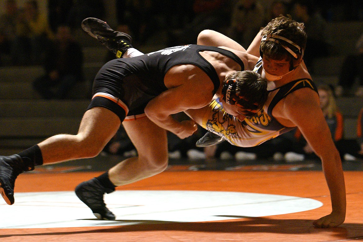 Flathead&#146;s Tucker Nadeau wrestles Missoula Big Sky&#146;s Tommy Leonard at 205 pounds at Flathead High School on Thursday. Nadeau won by pin. (Casey Kreider/Daily Inter Lake)