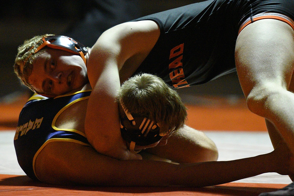 Flathead&#146;s Bo Meyer wrestles Missoula Big Sky&#146;s Tristen Haarwas at 138 pounds at Flathead High School on Thursday. Meyer won by decision, 1-0. (Casey Kreider/Daily Inter Lake)