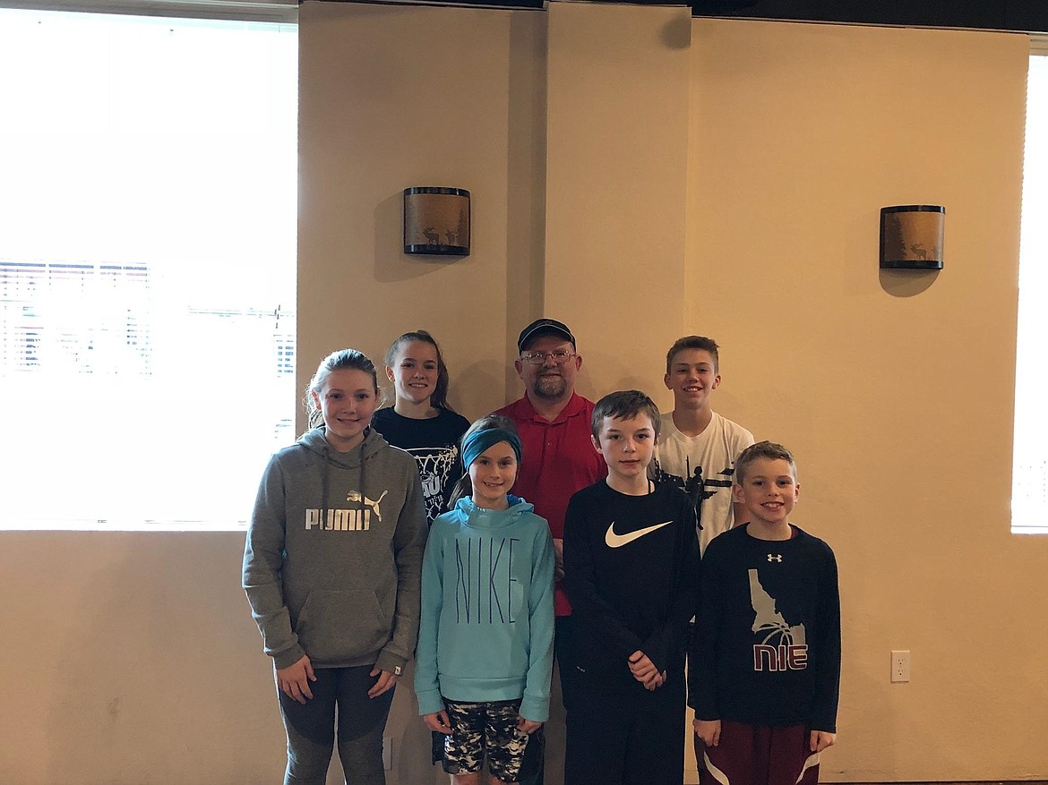 Courtesy photo
Six Coeur d&#146;Alene-area kids participated in the North Idaho District Elks Hoop Shoot in Kellogg on Jan. 20, representing the Coeur d&#146;Alene Elks Lodge. In the front row from left are girls&#146; 10-11 year-old champion Payton Sterling, girls&#146; 8-9 year-old runner-up Kaylee Paulson, boys&#146; 8-9 runner-up Jace Taylor, and boys&#146; 10-11 year-old champion Paxton Winey; and back row from left, girls&#146; 12-13 year-old champion Alexis Heath, Coeur d&#146;Alene Elks Hoop Shoot Director Rick Alexander, and boys&#146; 12-13 year-old champion Kolton Mitchell. The four age group winners qualified for the Idaho State Elks Hoop Shoot Championships in Blackfoot  on Feb. 3.