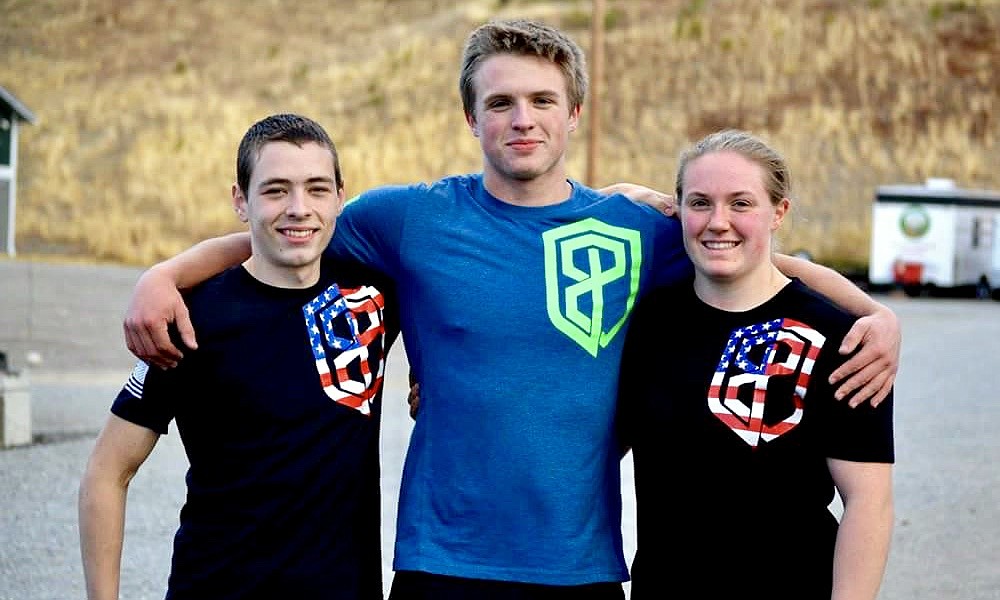 Courtesy photo
Three teen athletes from Crossfit Cd&#146;A&#146;s Heart &amp; Barbell Club have qualified for the national junior weightlifting championships in Spokane Feb. 15-18. From left are Vince Russo, Tyler Carlock and Shay Carlock.
Russo, 17, is dual-enrolled at Coeur d&#146;Alene Charter Academy and North Idaho College. He competed at USA Weightlifting youth nationals in 2017, and was a 2017 Idaho state champion in the 62 kg weight class. He holds three state junior records in the 62 kg weight class &#151; 99 kg clean and jerk, 74 kg snatch and 173 kg total.
Shay Carlock, 17, is dual-enrolled at NIC and the STEM Academy in Rathdrum. She finished ninth at the 2017 Youth World Championships, has earned 12 national-level medals, is a two-time state champion, and currently holds 15 state records.
Tyler Carlock, 15, attends Lakeland High. He finished fourth at 2017 youth nationals. He is a state champion and currently holds three state records.
Shay Carlock coaches Tyler and Vince; Derek Hutchinson is another Crossfit coach.