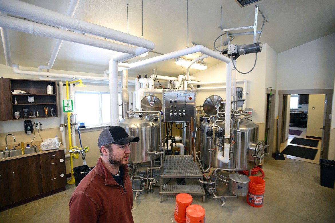 Joe Byers, director of the brewing program at Flathead Valley Community College, stands in front of the brewhouse inside the Brewing Science and Operations building on Thursday, Jan. 11. (Casey Kreider/Daily Inter Lake)