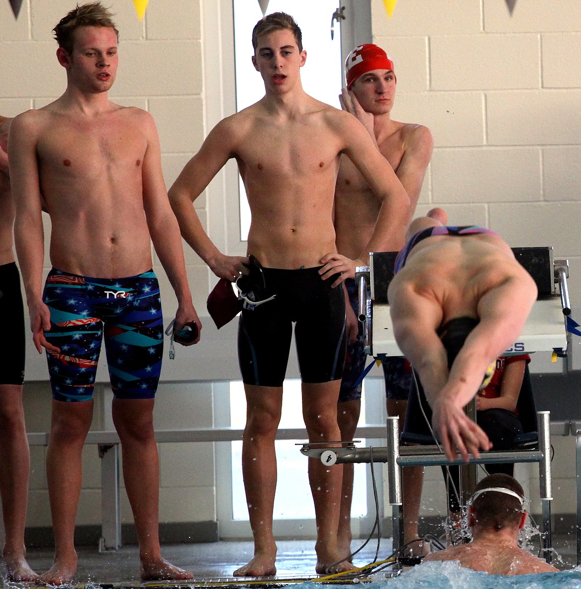 Rodney Harwood/Columbia Basin HeraldThe Moses Lake 200-yard medley relay is currently ranked No. 3 in the state. The relay includes, Noah Heaps, from left, Zach Washburn, Ander Molitor, going off the blocks, and Eric Kemper, in the water.