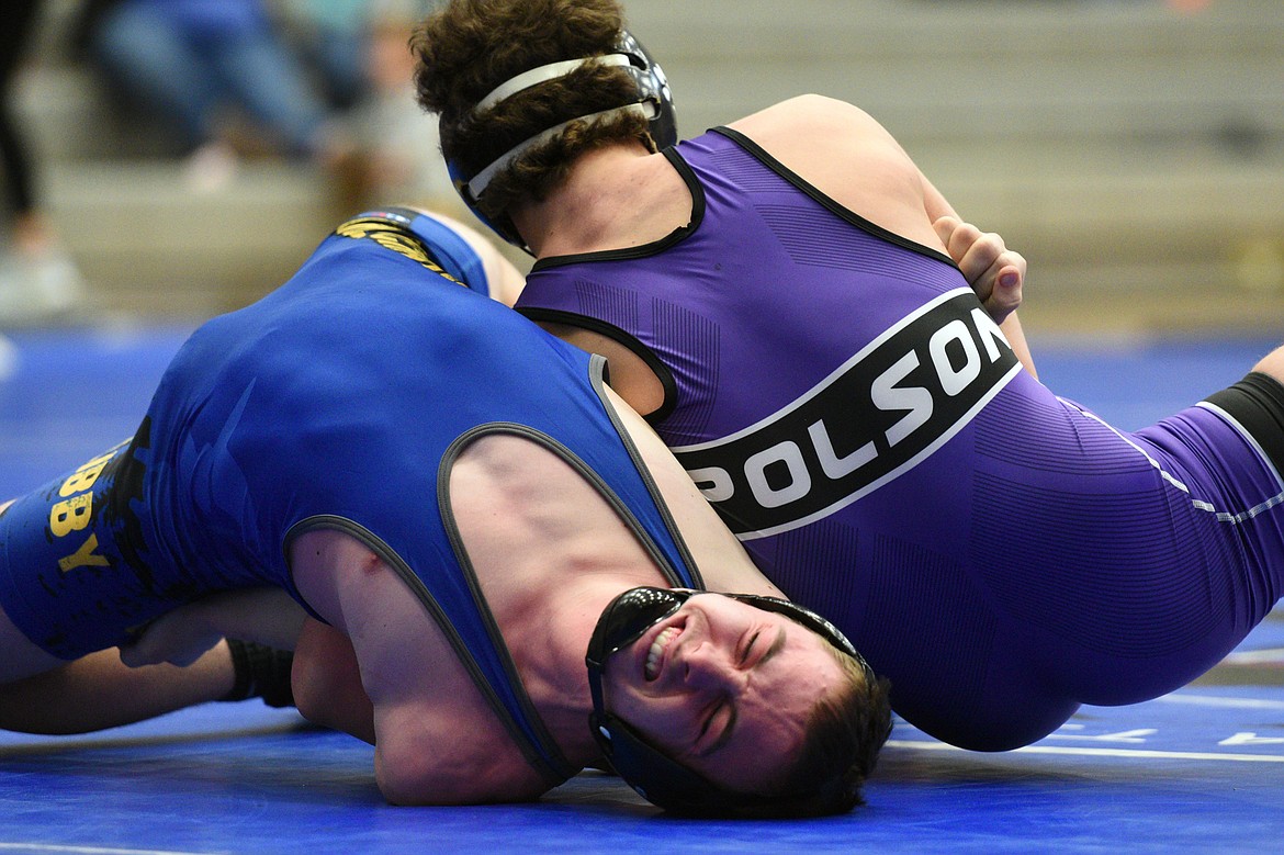 Polson&#146;s Hunter Fritsch wrestles Libby&#146;s Tanner Wood at 170 pounds at Columbia Falls High School on Tuesday. Fritsch won by decision. (Casey Kreider/Daily Inter Lake)