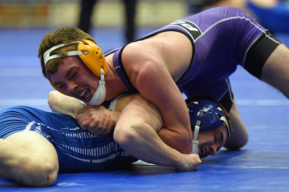 Polson&#146;s Jarod Farrier works toward a pin of Columbia Falls&#146; Easton Sempf at 132 pounds on Tuesday. (Casey Kreider/Daily Inter Lake)