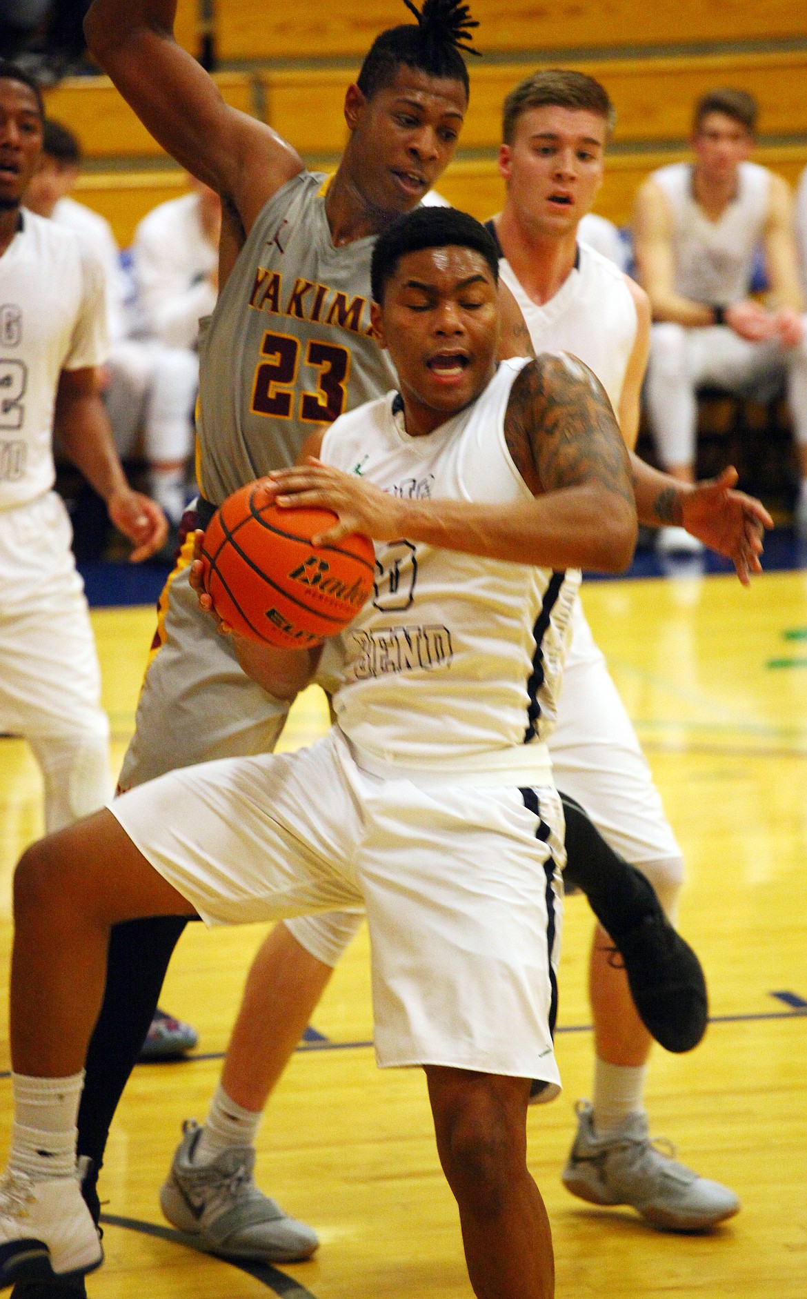 Rodney Harwood/Columbia Basin Herald
Big Bend freshman Mauricio Smith (0) hauls in one of his nine defensive rebounds Wednesday night against Yakima Valley. Smith finished with a double-double and the Runnin' Vikings beat the Yaks.