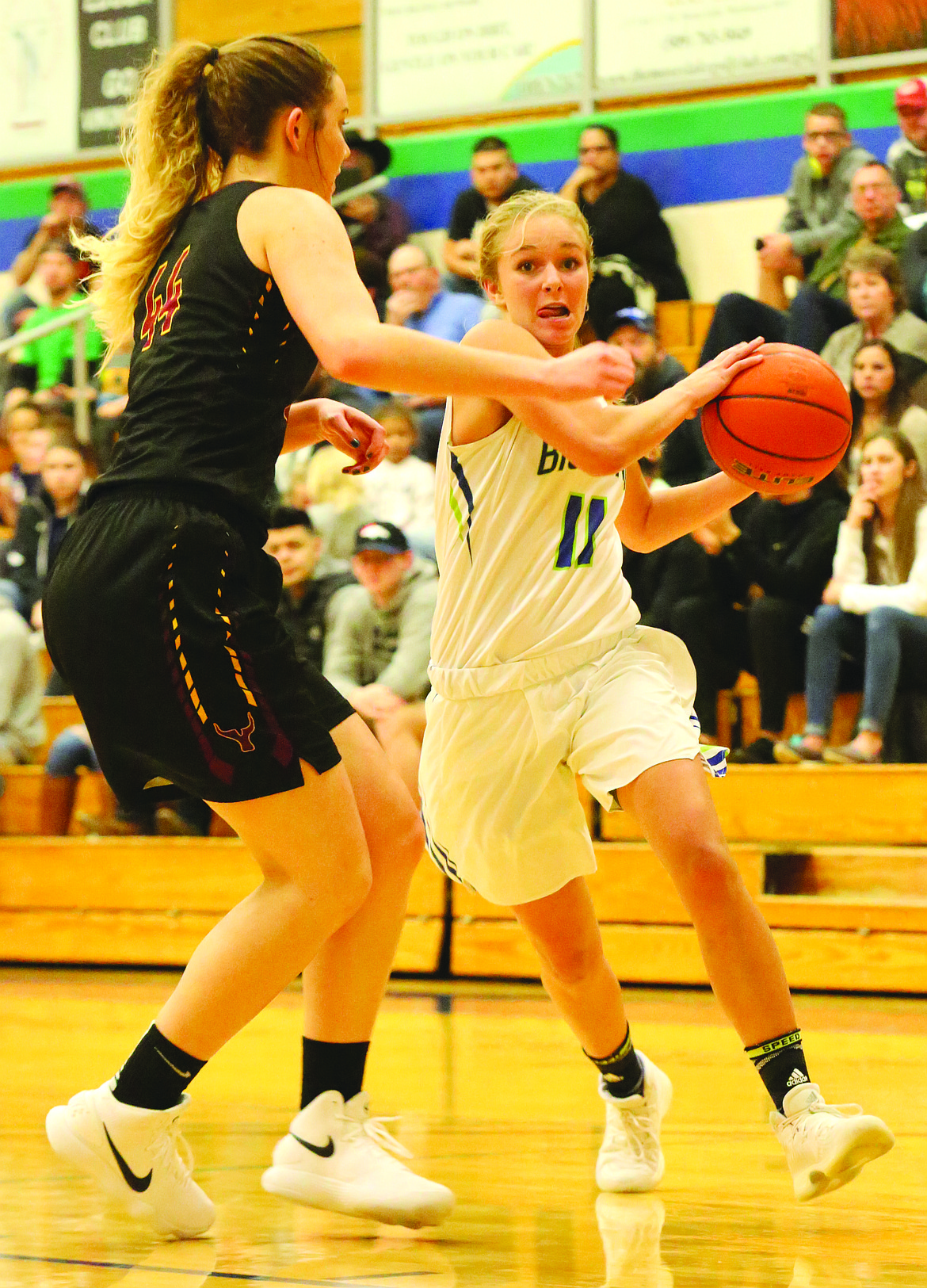 Connor Vanderweyst/Columbia Basin Herald
Big Bend guard Miranda Johnson (right) drives against Yakima Valley's Kali Kruger.