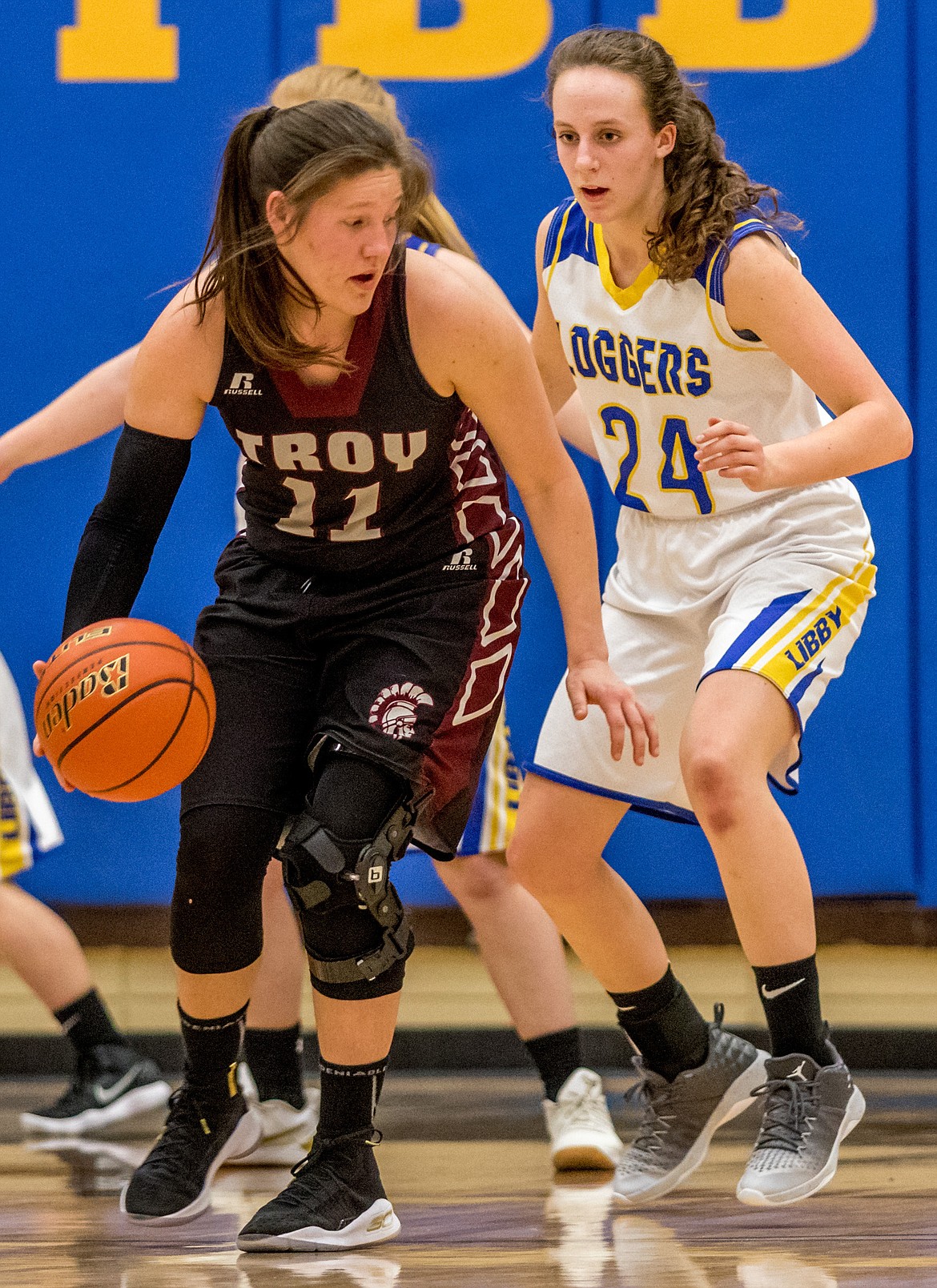 Troy&#146;s Allie Coldwell and Libby&#146;s Jayden Winslow keep an eye on one another in Thursday&#146;s matchup in Libby. (John Blodgett/The Western News)