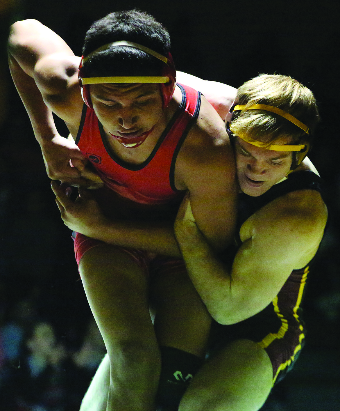Connor Vanderweyst/Columbia Basin Herald
Moses Lake's Beau Mauseth (right) tries to keep a hold of Sunnyside's Moises Morales.