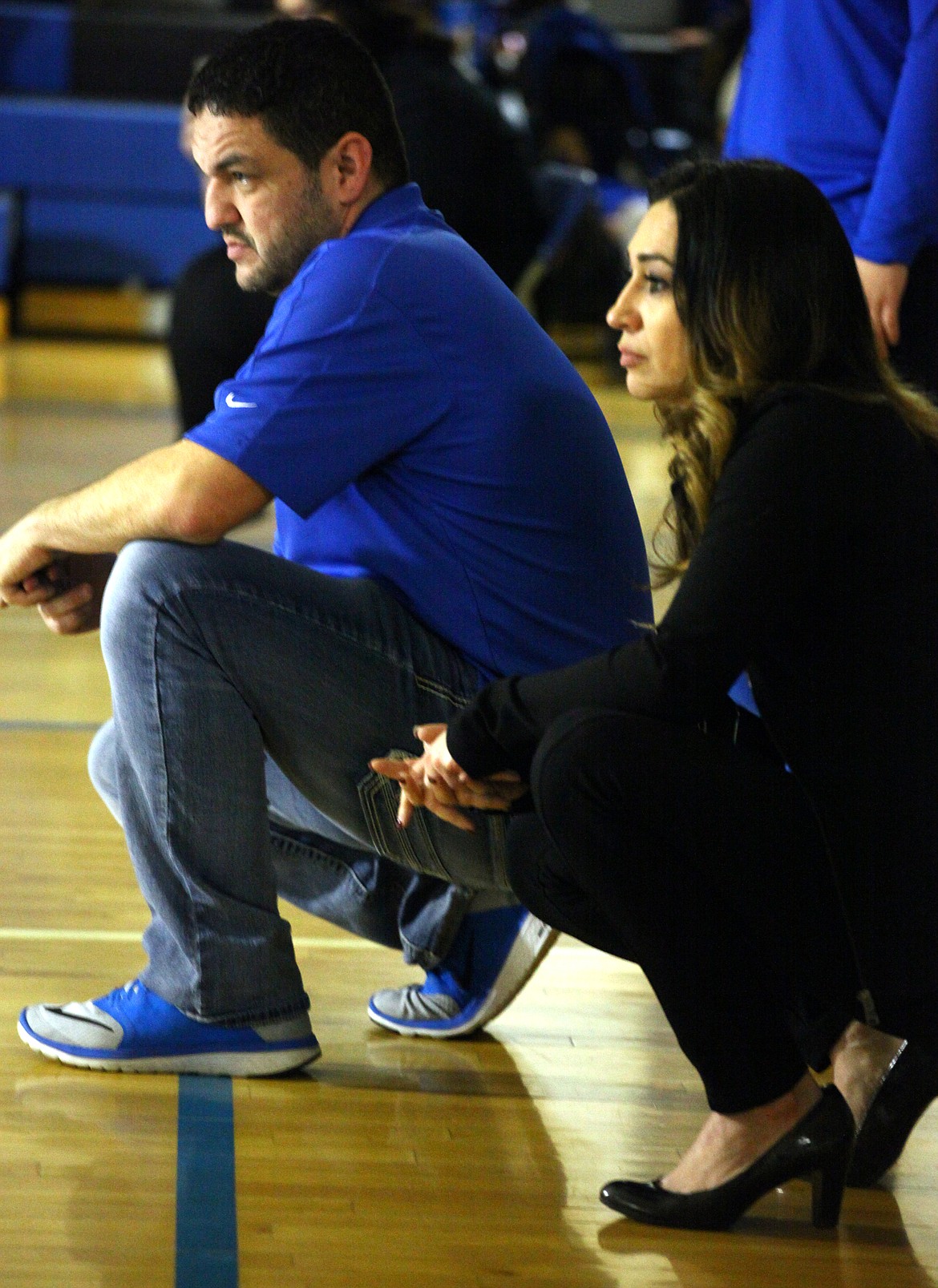 Rodney Harwood/Columbia Basin HeraldWarden girls wrestling coach Valerie Hernandez looks on during the action Tuesday night against Othello.