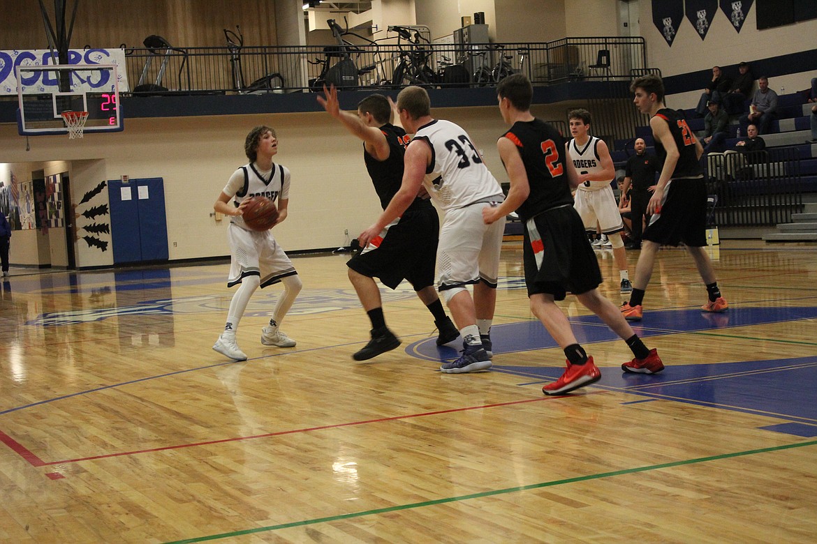 The Bonners Ferry  boys&#146; basketball team hosted the Post Falls JV on Jan. 18 and earned a 61-49 win over the Trojans.







Dylan Hittle is sure to have his teammates back during the game against Post Falls.

Photos by Tanna Yeoumans