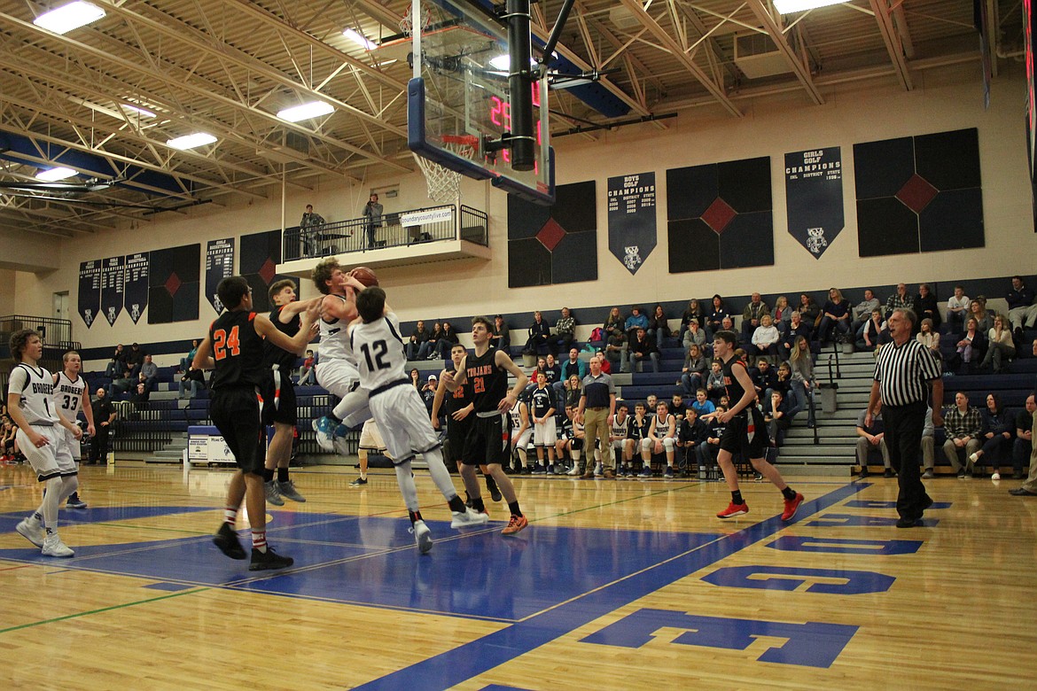 Photo by Tanna Yeoumans
Dylan Hittle is sure to have his teammates back during the game against Post Falls.