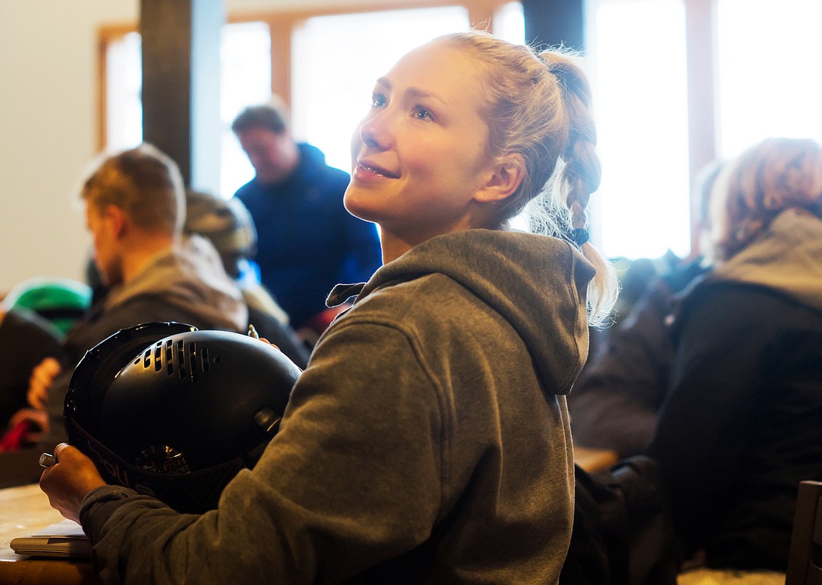 Maggie Voisin smiles for a photo while signing a helmet during the &quot;Ski with Maggie&quot; day at Whitefish Mountain Resort in December. (Daniel McKay/Whitefish Pilot)