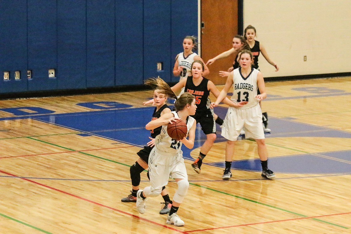 Photo by Mandi Bateman
The girls keep an eye on their teammates in order to keep the ball away from the other team.