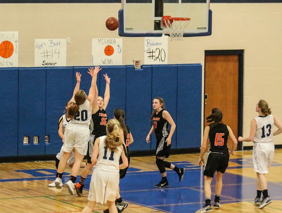 Photo by Mandi Bateman
Kadi Bateman	jumped to shoot over the heads of the defense.