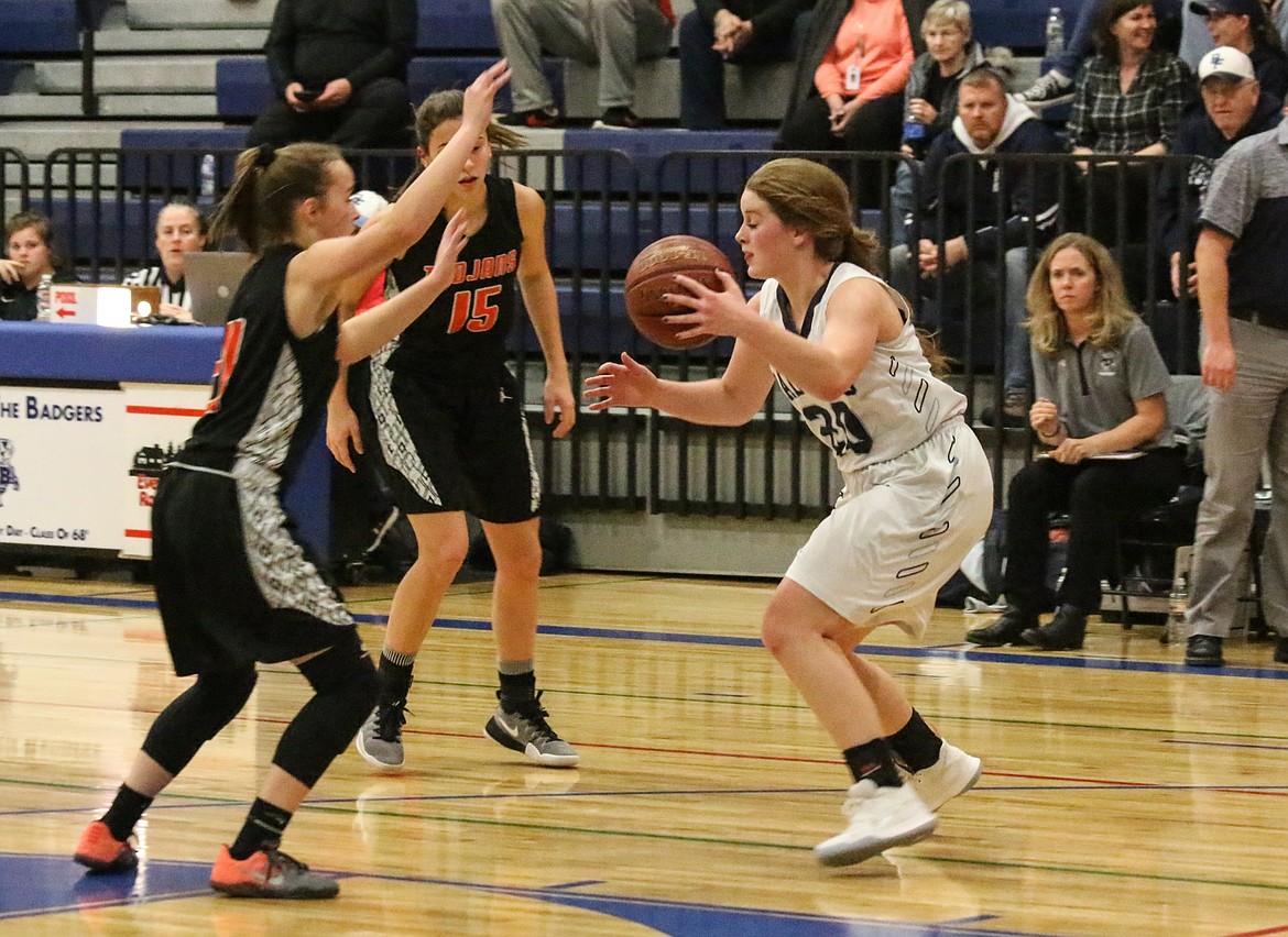 Photo by Mandi Bateman
After a 15-15 first quarter tie, the Badgers outscored the Trojans 15-6 in the second quarter for a 9 point halftime lead,