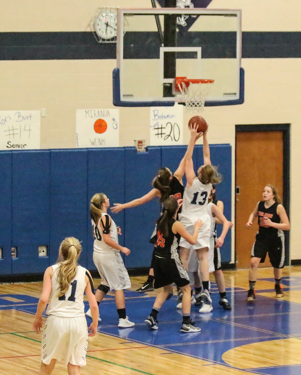 Photo by Mandi Bateman
Miranda Wenk jumps to catch the rebound.