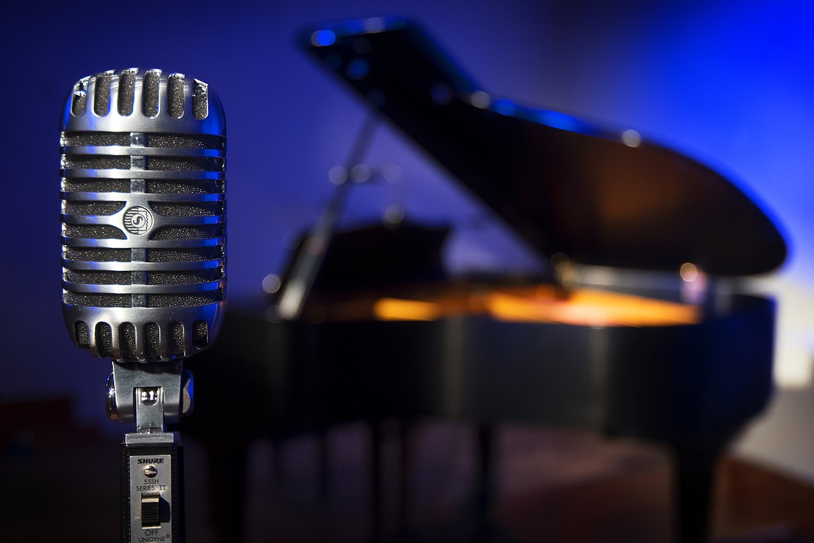 Equipment at the LaSalle Angel Theatre includes vintage microphones and a baby grand piano. (Jeremy Weber photo)