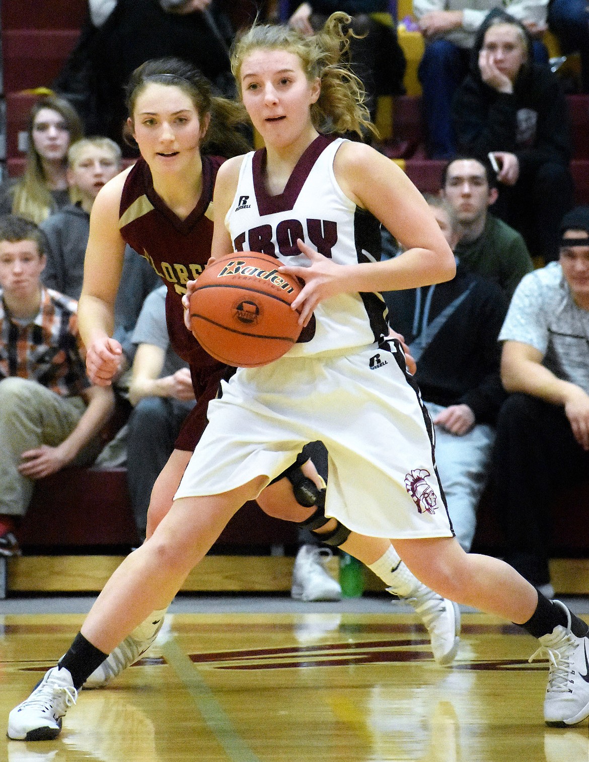 Troy&#146;s Annie Day looks for a teammate to pass to against Florence in Troy.