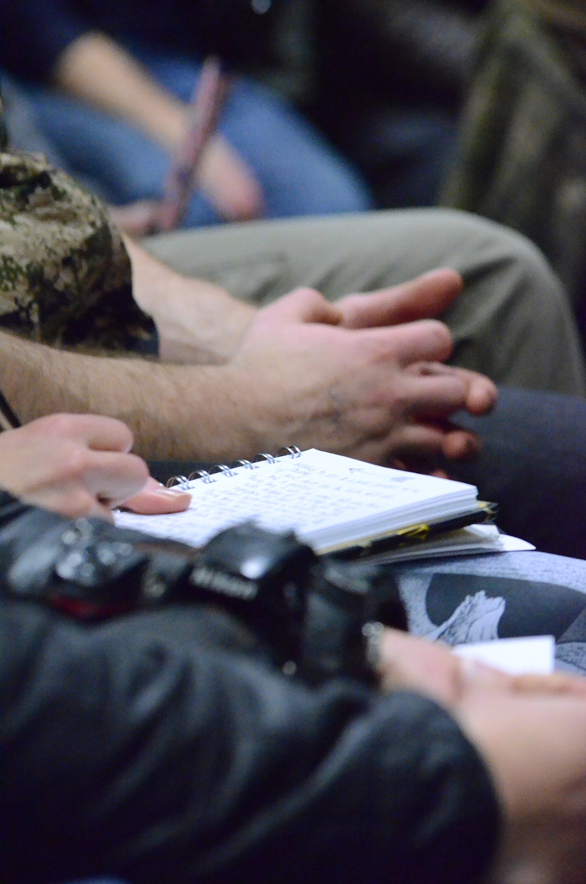 Many supporters took notes from each speaker who took the stage.  (Erin Jusseaume/ Clark Fork Valley Press)