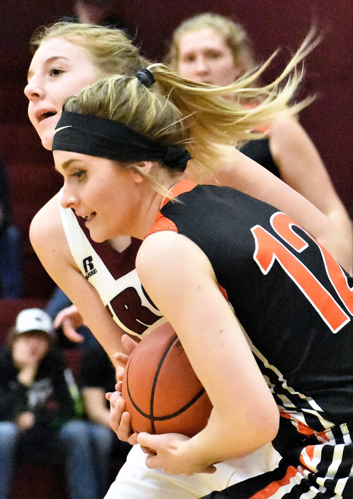 Troy&#146;s Annie Day, left, and Lindsay Laws of Plains fight for the ball Friday. (Photo by Svetlana Harper)